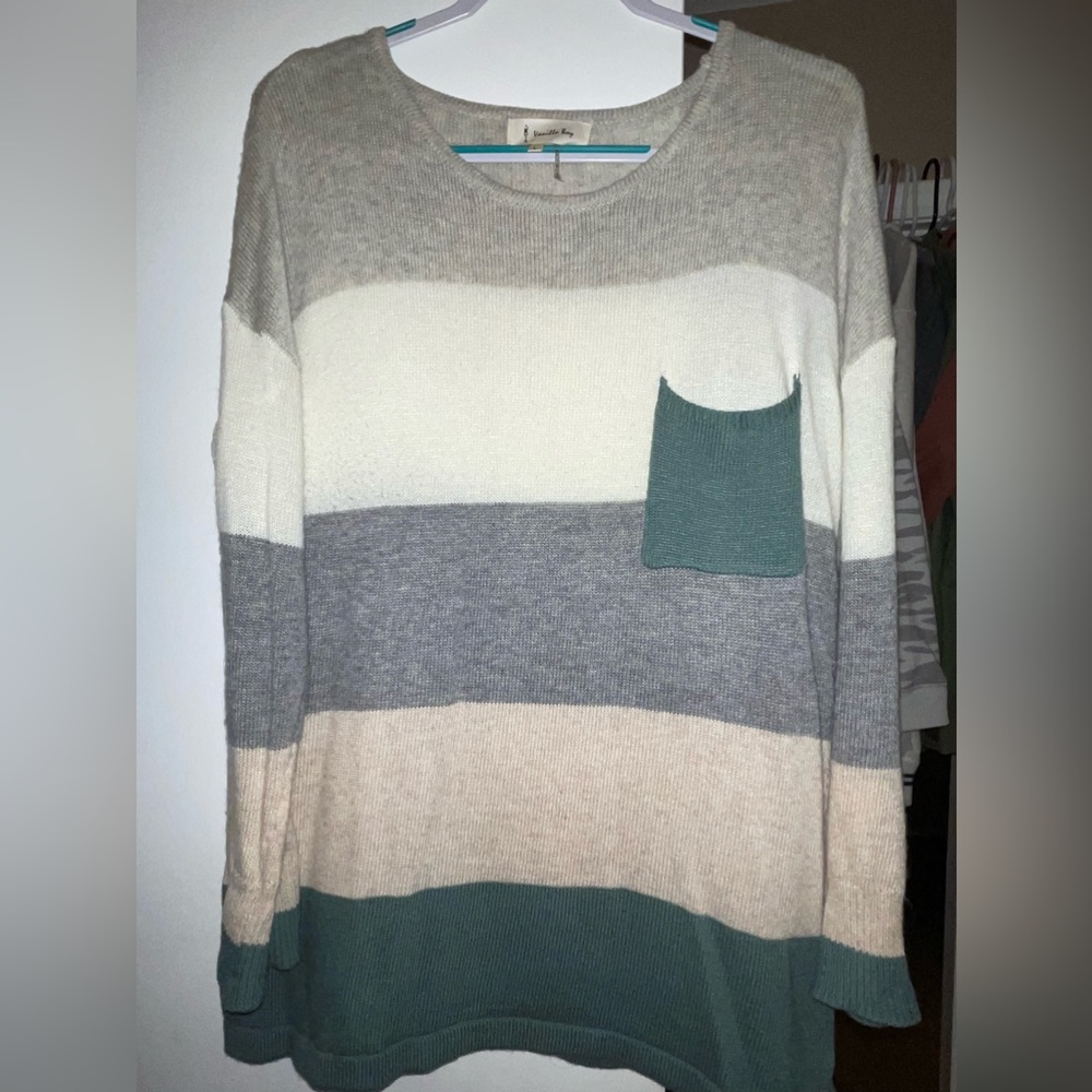 Boutique brand striped sweater with pocket detail, size L but fits like an XL